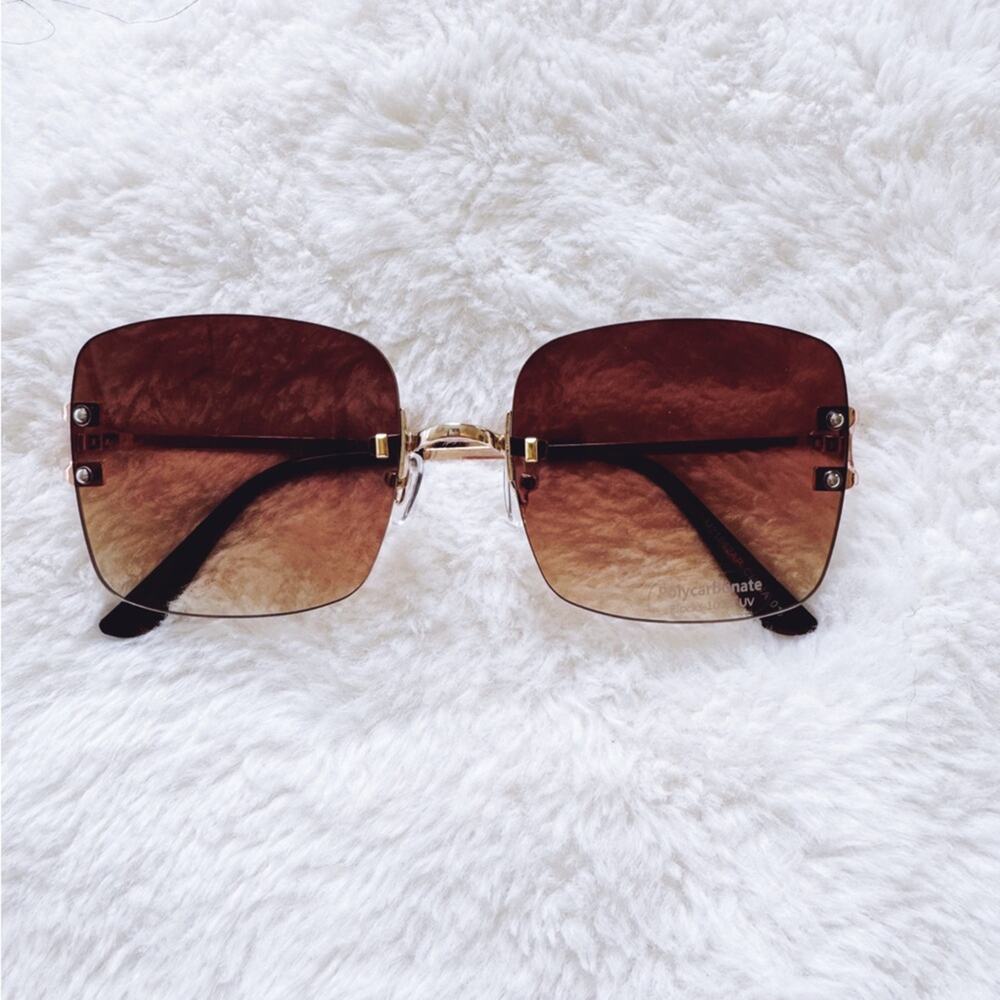 Laurel Clear Brown Rimless Sleek Sunglasses